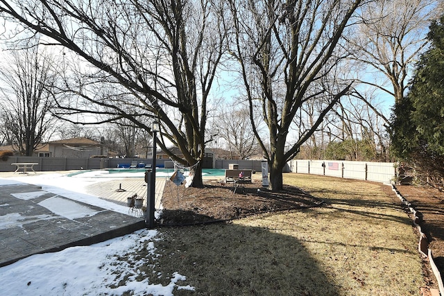 view of yard with a patio area and a covered pool