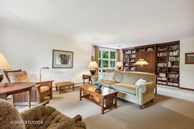 living room with carpet floors and a baseboard heating unit