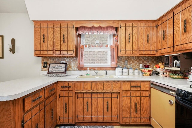 kitchen featuring sink, black range oven, kitchen peninsula, dishwasher, and backsplash