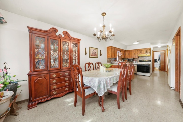 dining room with a chandelier