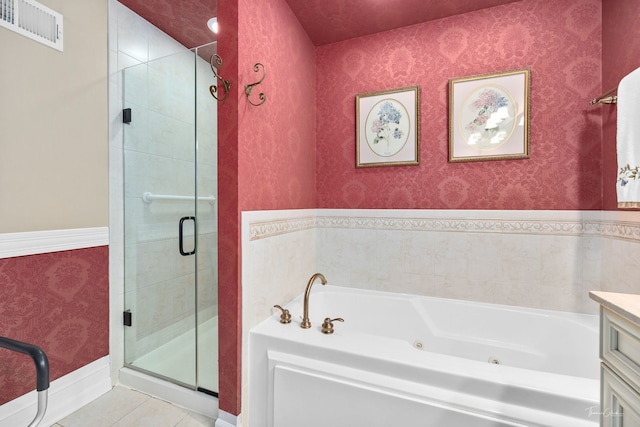 bathroom with vanity, tile patterned flooring, and independent shower and bath