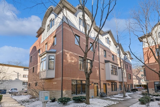 view of snow covered building