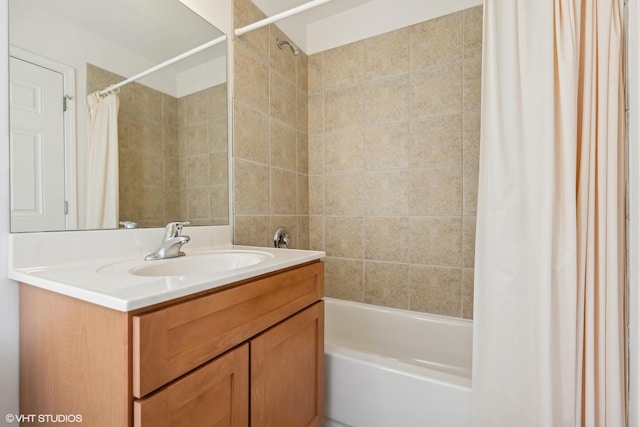 bathroom with vanity and shower / bath combo