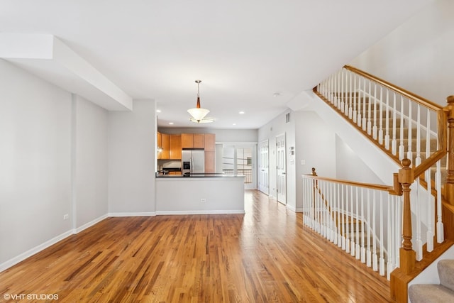 interior space with light hardwood / wood-style floors