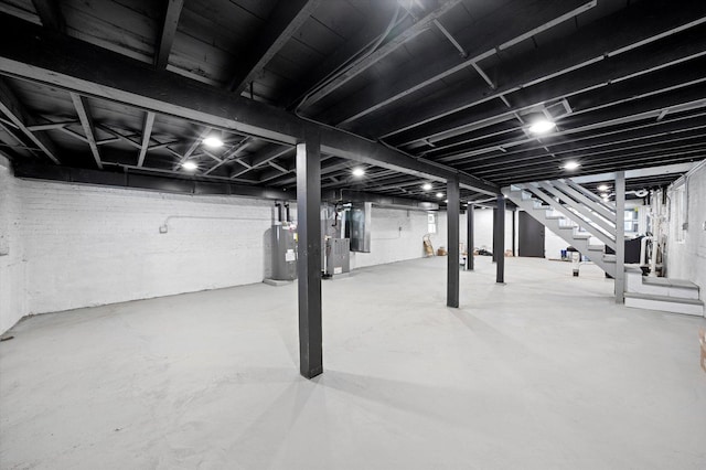 basement featuring electric water heater