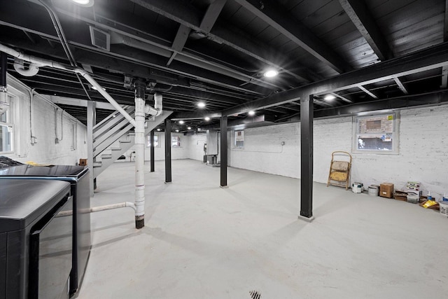 basement featuring separate washer and dryer