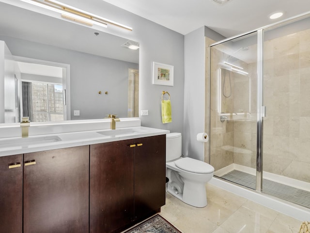 bathroom with vanity, toilet, an enclosed shower, and tile patterned flooring