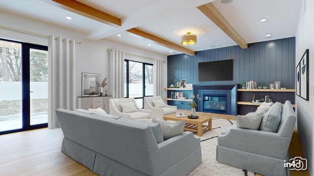 living room with light hardwood / wood-style flooring, beam ceiling, and wooden walls