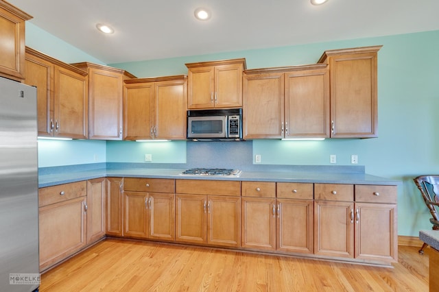 kitchen featuring appliances with stainless steel finishes and light wood-type flooring