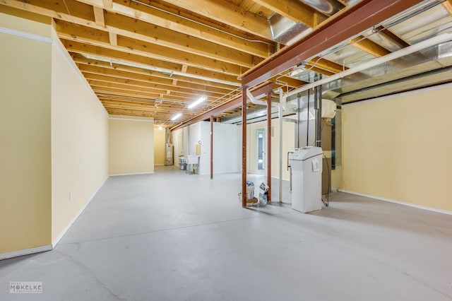 basement featuring water heater