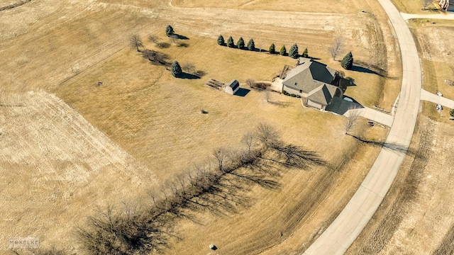 birds eye view of property featuring a rural view