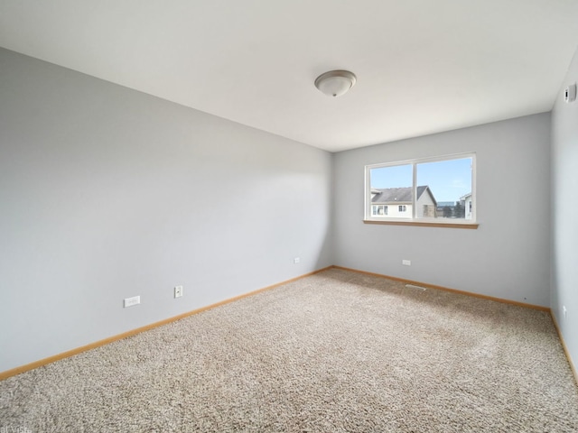 empty room with carpet flooring