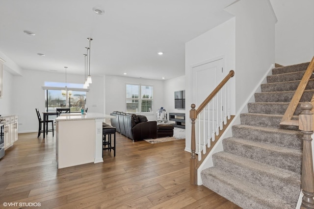 interior space with hardwood / wood-style floors and sink