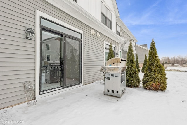 view of snow covered patio