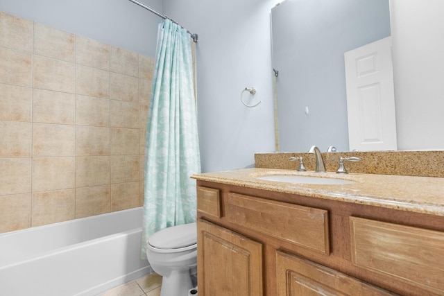 full bathroom with vanity, tile patterned floors, toilet, and shower / bath combo