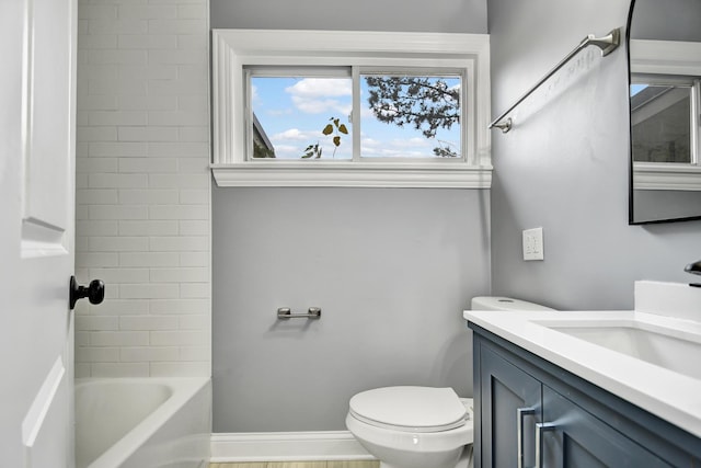 full bathroom featuring vanity,  shower combination, and toilet