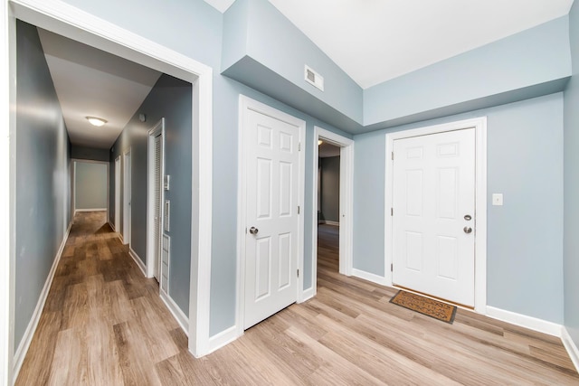 foyer featuring light wood-type flooring