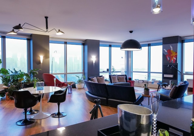 living room featuring hardwood / wood-style flooring and floor to ceiling windows