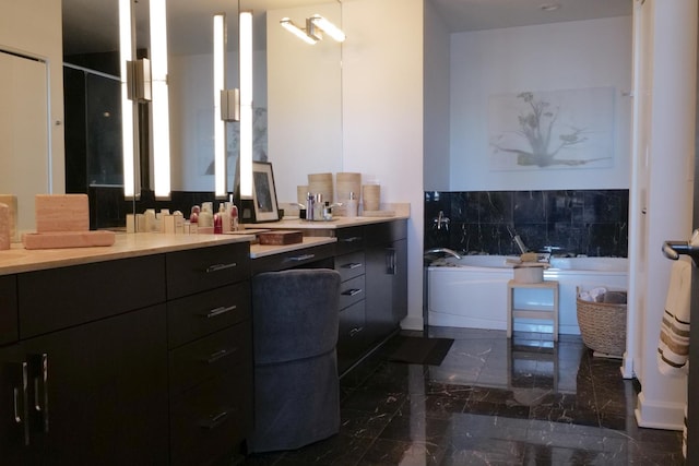 bathroom with vanity and a bathing tub