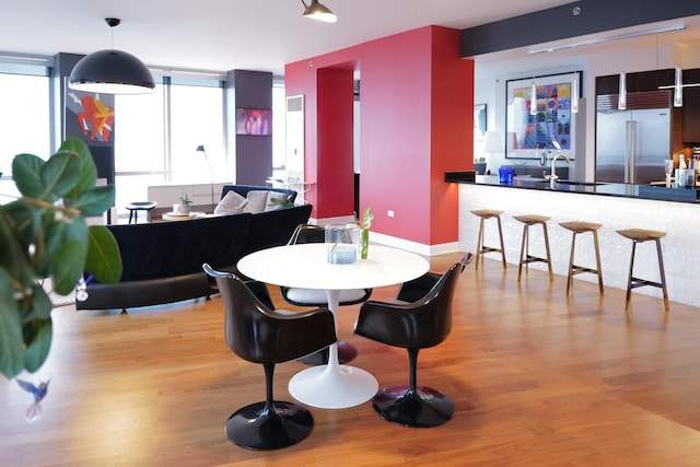 dining space featuring light hardwood / wood-style floors