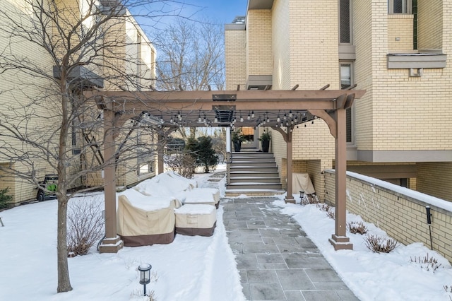 view of snow covered patio