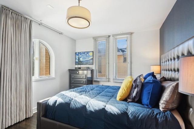 bedroom featuring dark hardwood / wood-style floors