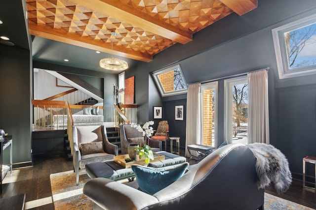 interior space with beamed ceiling and dark hardwood / wood-style flooring