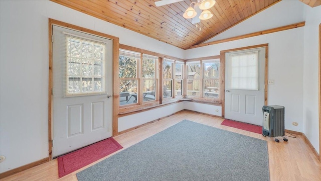 doorway to outside featuring lofted ceiling, wooden ceiling, a ceiling fan, baseboards, and light wood-type flooring