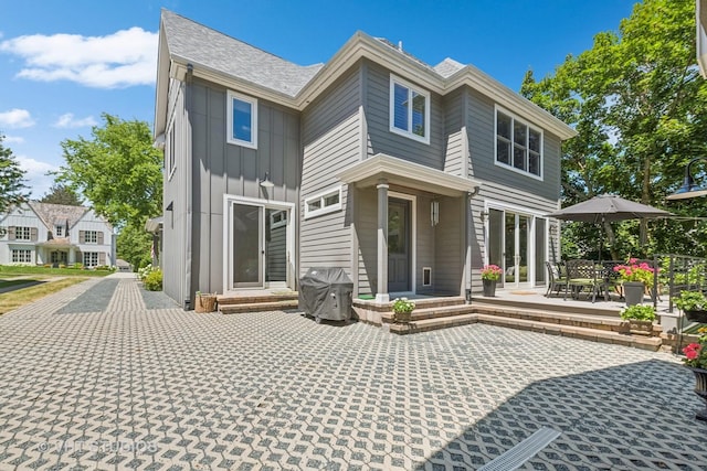 rear view of house with a patio area