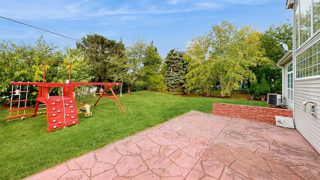 view of patio / terrace with central AC unit and a playground