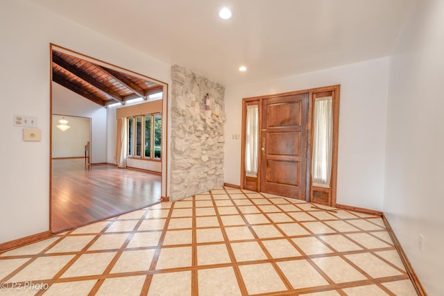 foyer with lofted ceiling with beams, recessed lighting, wood finished floors, wood ceiling, and baseboards