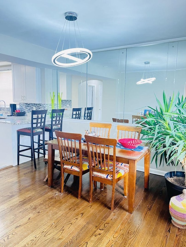 dining room with light hardwood / wood-style flooring