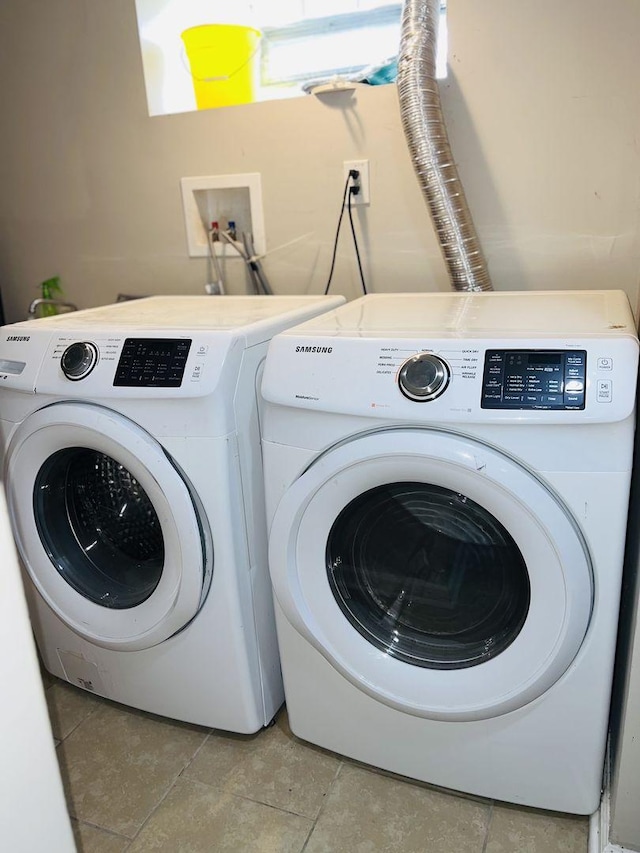 laundry area with separate washer and dryer