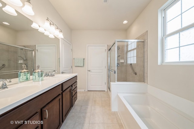 bathroom featuring vanity, separate shower and tub, and tile patterned flooring