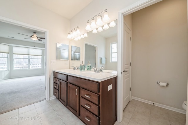 bathroom featuring tile patterned flooring, vanity, plenty of natural light, and ceiling fan