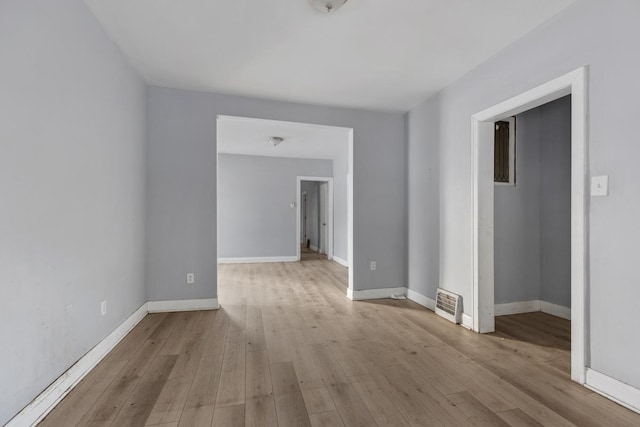 empty room with light wood-type flooring