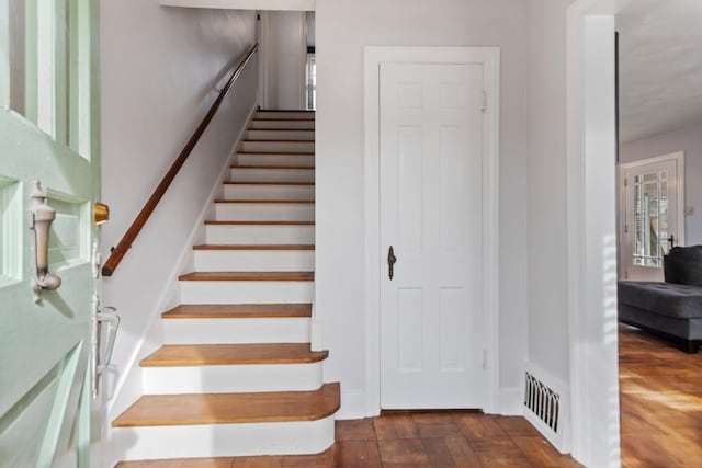 stairs with parquet flooring