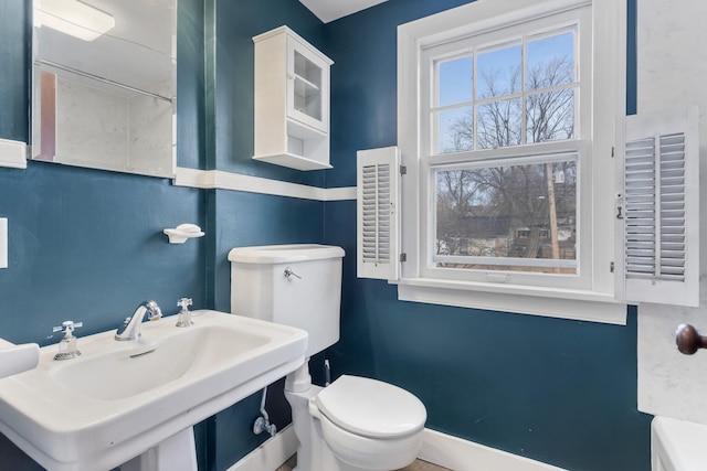 bathroom with sink and toilet