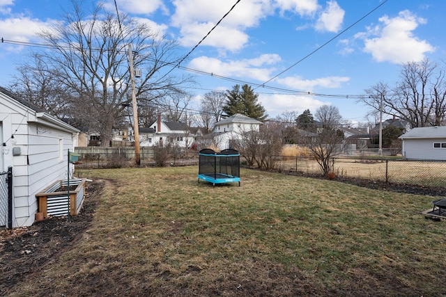 view of yard with a trampoline