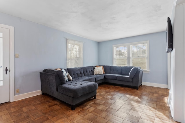 living room with parquet flooring