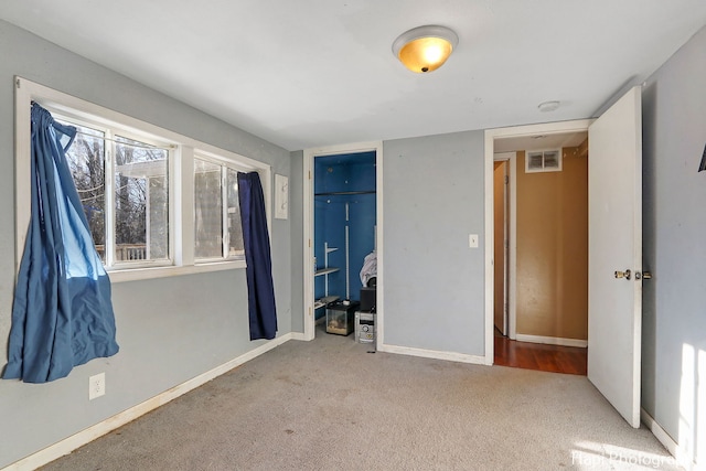 unfurnished bedroom with carpet flooring