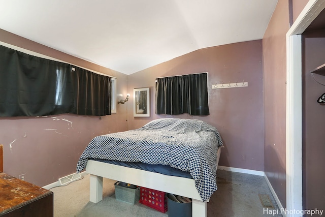 bedroom with vaulted ceiling