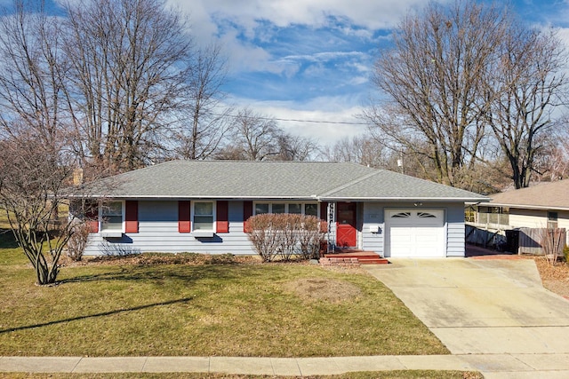 ranch-style home featuring a garage and a front yard