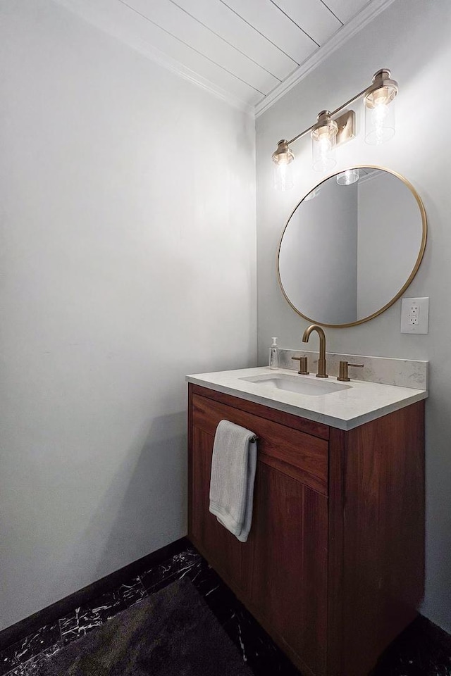 bathroom with crown molding, wood ceiling, and vanity