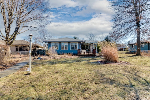 view of front of property with a front lawn