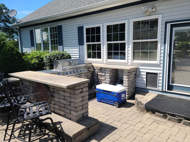 view of patio with area for grilling