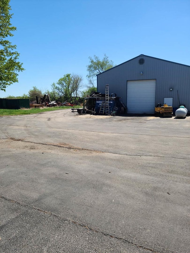 view of outdoor structure with a garage