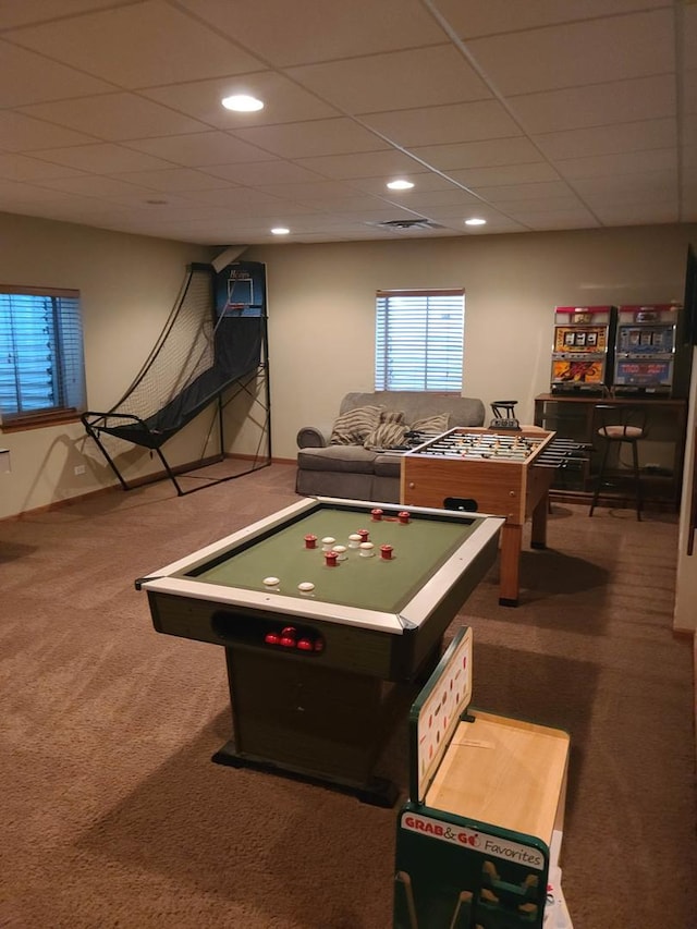 playroom with a paneled ceiling and carpet floors