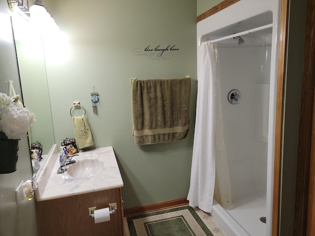 bathroom with vanity and a shower with shower curtain