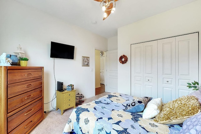 carpeted bedroom with a closet